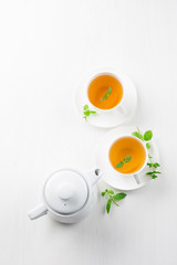 cup of herbal tea, white background