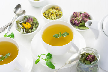 cup of herbal tea, white background