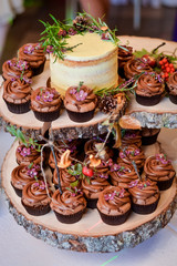 plates with wedding cupcakes on the table