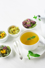 cup of herbal tea, white background