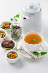 cup of herbal tea, white background