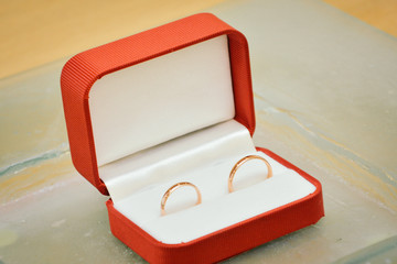 wedding rings in a red box