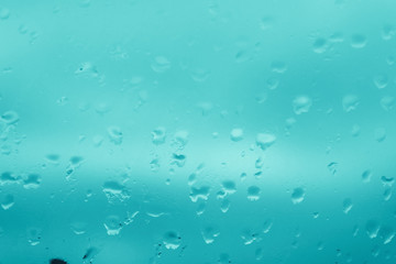 Fototapeta na wymiar raindrops on the glass 