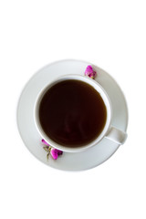 Cup of roses tea with rose