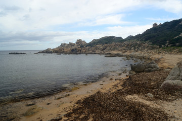 Fototapeta na wymiar La costa di Capo Ferrato