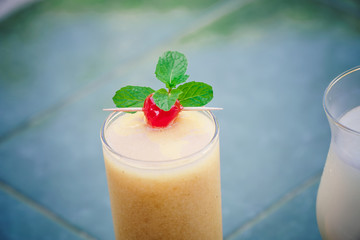 fruit cocktail detail with a cherry on top