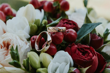 wedding rings and flowers