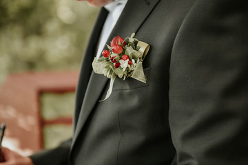 groom with bouquet
