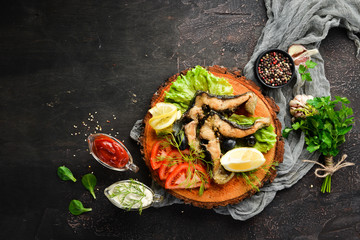 Steak sturgeon fish with vegetables. Barbecue. Top view. Free space for your text.