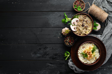 Ukrainian cuisine. Banosh with bacon and mushrooms. Top view. Free space for your text. Rustic style.