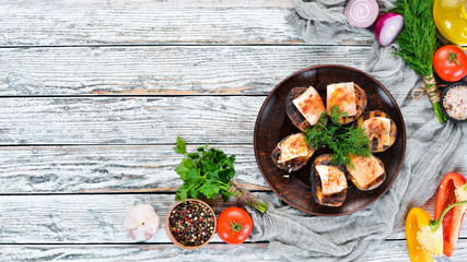 Potatoes fried with lard and garlic. Ukrainian Traditional Cuisine. Top view. Free space for your text. Rustic style.