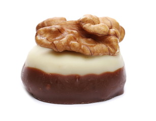 Chocolate with walnut, candy isolated on white background, macro