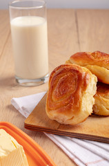 Homebaked buns with glass of milk