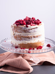 Naked cake with raspberry
