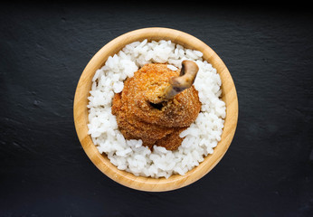 Breaded fried chicken leg with white rice
