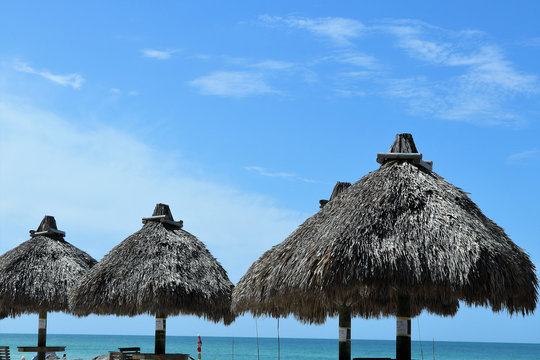 tiki huts on the florida guld of mexico beach