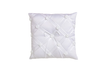 Pillows isolated. Beautiful white wedding rings pillow isolated on a white background. Concept of wedding celebration.