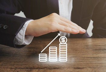 Businessman with stack of coin icon.Money protection concept.