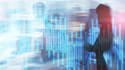 Trading and investment concept with candle chart, financial graph on blurred background abstract background.