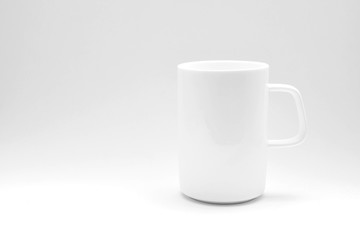 white ceramic cup of coffee with shadow