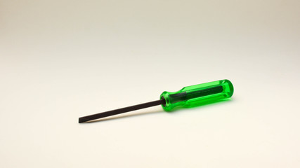 green screwdriver with shadow