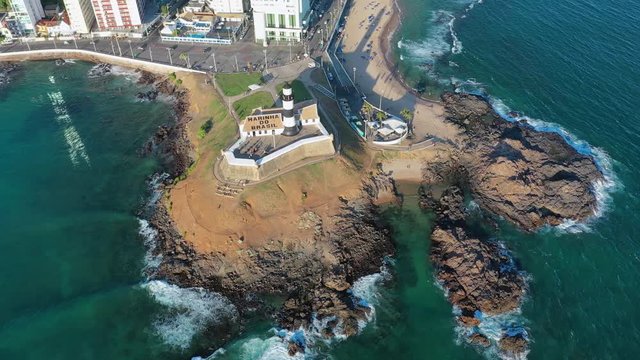 Aerial view of cityscape of Salvador, modern capital of state Bahia, nautical museum Bahia Nautico (lighhouse), beach Praia Farol da Barra - Brazil, landscape panorama of South America