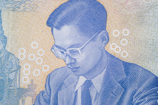 The story and biography of King Rama 9 on Thai Banknotes. Macro 1:1 Photograph.