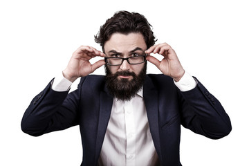 bearded business man isolated on white background, raised an eyebrow and seriously looks at the...