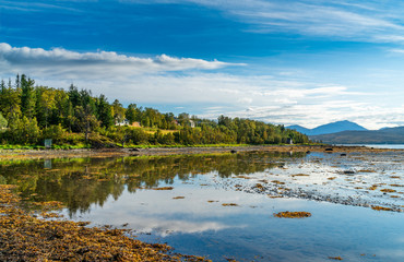 Fototapeta premium Hakoya - the 3.69-square-kilometre island located in the Sandnessundet strait between the islands Kvaloya and Tromsoya in Troms county, Norway.