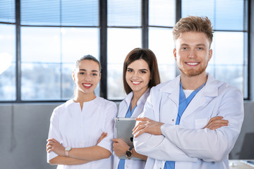 Smart medical student with his classmates in college