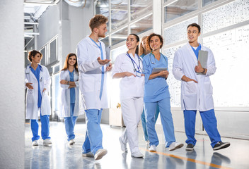 Group of medical students in college hallway