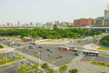 View of a city road intersection in the downtown area near Taipei main station in Taipei, Taiwan