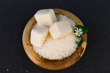 sugar on black background