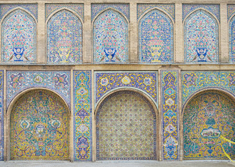 ISFAHAN, IRAN - march 4: Entrance of historical tiled mosque, Iran, 17th century structure on march 4, 2019. The 3rd largest city of Iran, Isfahan is example of Islamic culture. Architectural fragment