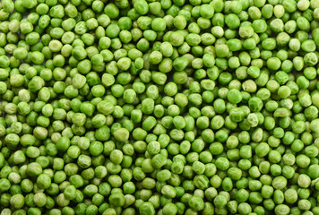 Fototapeta na wymiar Green peas as a background. Green peas wallpaper