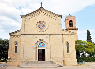 Fototapeta na wymiar San Giustino, Italy. Facade of catholic church in San Giustino (Chiesa arcipretale di San Giustino).