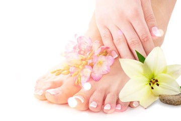 Female legs and hands with beautiful flower