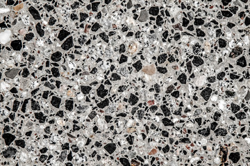 Concrete floor with marble chips as background