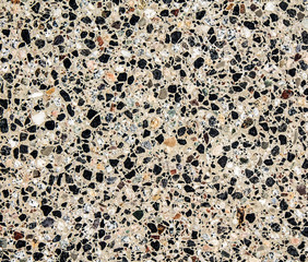 Concrete floor with marble chips as background