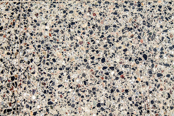 Concrete floor with marble chips as background