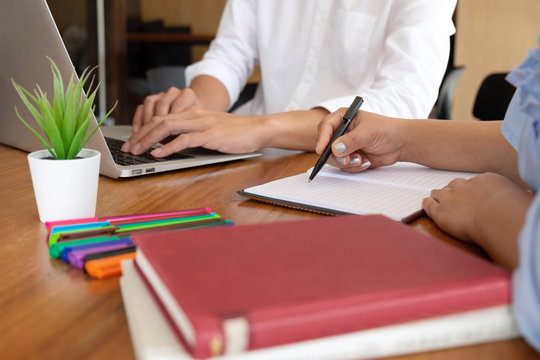 Tutor, learning, education, Group of young people learning studying lesson in library during helping teaching friend education prepare for exam, youth campus friendship teenager teens concept