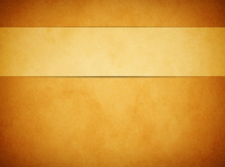 An elegant rich gold grunge texture background with a tan gold banner ribbon raised above. 