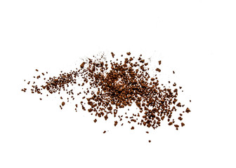 Instant coffee scattered on a white background