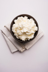 Homemade white Butter or Makhan/Makkhan in Hindi, served in a bowl. selective focus