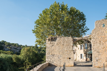 Fototapeta na wymiar The medieval stone architecture and the old narrow street of Lagrasse.