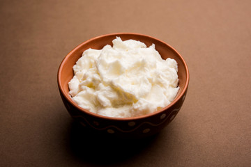 Homemade white Butter or Makhan/Makkhan in Hindi, served in a bowl. selective focus