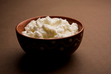 Homemade white Butter or Makhan/Makkhan in Hindi, served in a bowl. selective focus