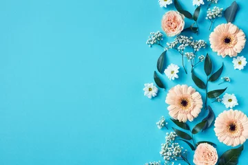 Foto auf Acrylglas Antireflex Beautiful pink and white flowers composition on blue background © baibaz