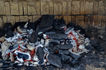 Part of stove brick masonry for barbecue with charcoal on fire, town, Zavet, Bulgaria, Europe 