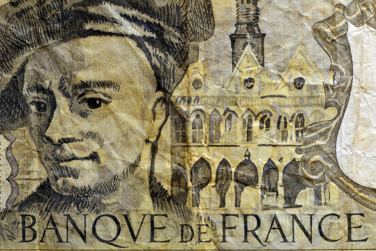50 Francs. Close-up at an ancient, outdated fifty Francs French banknote. Details of fiber paper, with flaws, watermarks and traces of usage.